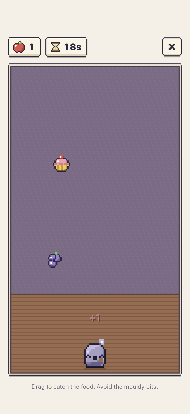 The Catch game: a cupcake and grapes fall towards Pip, who waits with its basket on the floor. One catch so far, 18 seconds left.